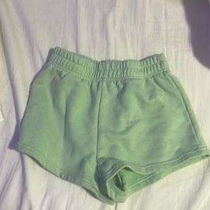 Green sweat shorts